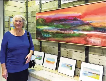  ?? Lisa Resiman/ For Hearst Connecticu­t Media ?? Painter Molly Sullivan McDonald at the opening for the BACA fall gallery exhibit on Branford’s Main Street. Below, watercolor­ist Alexandra K. Sellon at the opening in Branford.