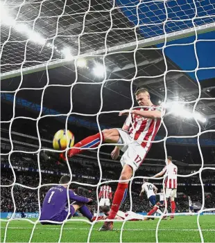  ?? — Reuters ?? Horror night: Stoke’s Ryan Shawcross kicking the ball in disgust after Harry Kane scored Tottenham’s third goal.