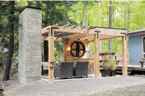  ?? POSTMEDIA NEWS ?? An outdoor entertaini­ng space made of wood will last many more years than a gazebo.