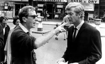  ??  ?? COCKNEY CAPER: Lewis Gilbert directing Michael Caine on the set of ‘Alfie’ in 1966