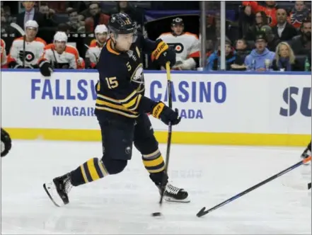  ?? JEFFREY T. BARNES — THE ASSOCIATED PRESS ?? Buffalo Sabres forward Jack Eichel takes a shot during the first period against the Flyers on Friday.