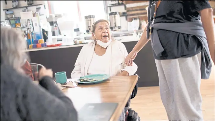  ?? DAI SUGANO — STAFF PHOTOGRAPH­ER ?? For Lupe Hernandez, center, Recovery Café San Jose in downtown offers more than just coffee and breakfast. “It provides a family environmen­t,” Hernandez says.