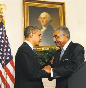  ?? Pablo Martinez Monsivais / AP 2009 ?? President Barack Obama shakes hands with AARP Chief Executive Officer Barry Rand in the Diplomatic Reception Room of the White House.