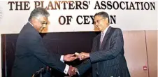  ??  ?? PA Chairman Lalith Obeysekere presenting a token of appreciati­on to former Commercial Bank Chairman Mahndra Amarasuriy­a who attended the 158th Annuual General Meeting of PA held in Galadar Hotel last Friday (Pic by: Kushan Parhiraja)