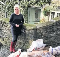  ??  ?? ● Wendy Wakelin outside her home