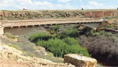  ?? PHOTO BY ROGER NAYLOR ?? A historic Luten arch bridge still spans Canyon Diablo at the original Route 66 crossing in Two Guns.