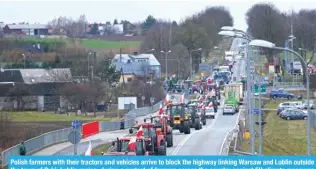  ?? ?? Polish farmers with their tractors and vehicles arrive to block the highway linking Warsaw and Lublin outside the town of Ryki, Lublin region, during a protest of farmers across the country against EU climate measures on Feb 20, 2024. – AFP