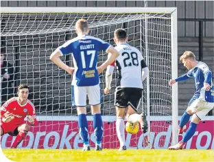  ??  ?? Stranraer’s Scott Agnew scores from a penalty to make it 2-1