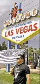  ?? GETTY ?? Raiders fan Matt Gutierrez of Nevada welcomes team as NFL votes to roll dice on move to Sin City.