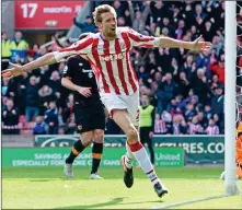  ??  ?? HEADS UP: Peter Crouch celebrates his 101st Premier League goal after heading home against Hull at the Bet365 yesterday