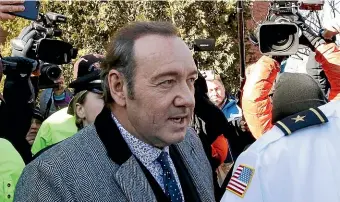  ?? AP ?? Actor Kevin Spacey departs from district court in Nantucket, Massachuse­tts, after he was arraigned on a charge of indecent assault and battery.