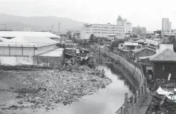  ??  ?? THE PLASTIC SCOURGE – An island of plastic trash clogs the mouth of the Guadalupe River in Cebu City. Mayor Tomas Osmeña is planning to ban plastic straws and bags to help reduce the volume of plastic garbage. (Juan Carlo de Vela)