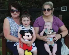  ??  ?? Doneraile natives Lauren Carey and her nan, Maria Carey; and Teddy Donnellan with his mum, Emma, enjoying their day out.