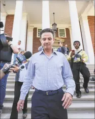  ?? Michael Clevenger / Associated Press ?? In this Sept. 27, 2017, file photo, Louisville men’s basketball coach Rick Pitino leaves Grawemeyer Hall after having a meeting with the university’s interim president Greg Postel in Louisville. Ky.
