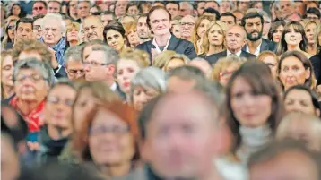  ??  ?? Director Quentin Tarantino, center top, attends the opening ceremony of the 8th Lumiere Festival.