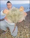  ??  ?? Tyronne Tanner with his thornback ray