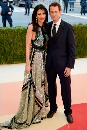  ?? AFP ?? Huma Abedin and Anthony Weiner arrive at the Costume Institute Benefit at The Metropolit­an Museum of Art in New York on May 2, 2016. —