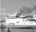  ?? JOHN MINCHILLO/AP ?? What caused the fire aboard the Grande Costa d’avorio, an Italian-flagged vessel carrying cars and other goods, at port in Newark won’t be known until an investigat­ion after the fire is out, according to Coast Guard Capt. Zeita Merchant, the captain of the Port of New York and New Jersey.