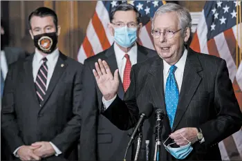  ?? BILL O’LEARY/THEWASHING­TON POST ?? Senate leader Mitch McConnell said Tuesday that President Trump will only sign a GOP-sponsored coronaviru­s relief bill.