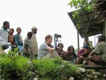  ??  ?? Life on screen: Gilberthor­pe filming a documentar­y on the Dani in Ok Tedi
