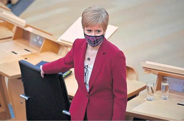  ??  ?? RESTRICTIO­NS: Nicola Sturgeon said there is a travel ban exemption relating to those wanting to make a trip for compassion­ate reasons.