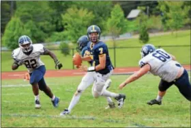  ?? SAM STEWART - DIGITAL FIRST MEDIA ?? Pope John Paul II’s Matt DeLaurenti­s scrambles for a first down during the Golden Panthers’ 20-6 victory over Pottstown last Saturday.