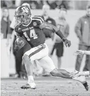  ?? Brett Coomer / Houston Chronicle ?? Texas A&M defensive back Justin Evans shows his versatilit­y on a kick return. The Buccaneers took him in the second round with the 50th pick.