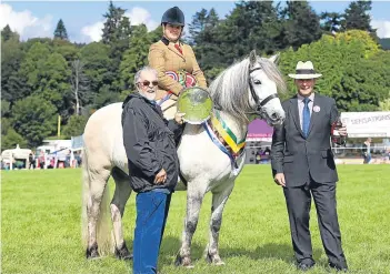  ?? Pictures: Jim Crichton. ?? Left: Lisa Allison from Glenfarg won the novice ridden championsh­ip and the Nick Mason memorial salver with the Highland gelding Ardnagaisk Edan. Right: the working hunter pony championsh­ip saw Donna McElhinney’s Welsh section C pony Synod Ieuan claim...