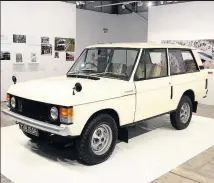  ??  ?? > Roger Crathorne (right) with a replica of the original Range Rover full size clay model at the new exhibition in Solihull