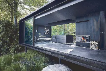  ??  ?? A 55-sqm. prefab house called Shelter by Vipp designer Morten Bo Jensen and furnished with Vipp products. It’s a prototype they placed in a forest and by lake near Kristianst­ad, Sweden. “We opened it as a hotel, so you can actually book it for a night....