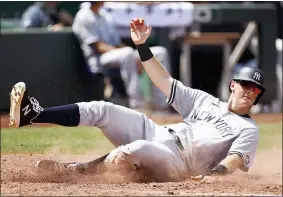  ?? COLIN E. BRALEY - THE ASSOCIATED PRESS ?? New York Yankees’ DJ LeMahieu scores off an Aaron Judge single in the fourth inning of a baseball game against the Kansas City Royals at Kauffman Stadium in Kansas City, Mo., Wednesday, Aug. 11, 2021.