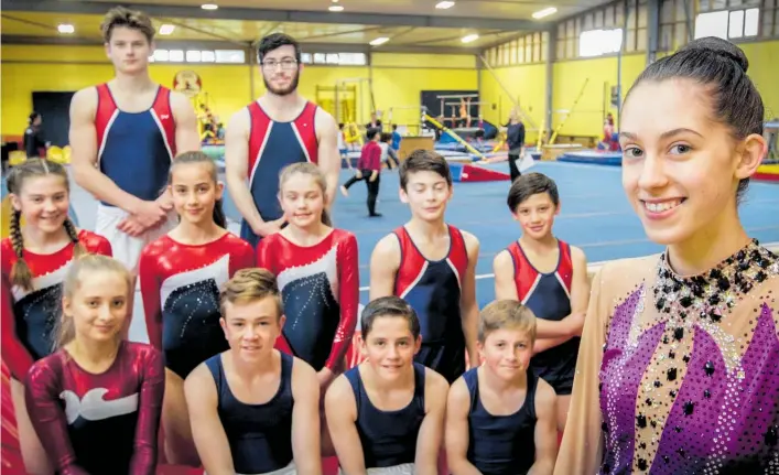  ?? Photo / Paul Taylor ?? Omni Gymnastic Centre member Lia Horsley, 16, with other Hawke’s Bay representa­tives competing at the October 3-6 national championsh­ip in Tauranga.