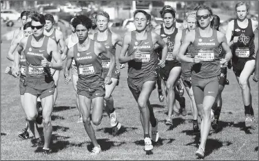  ?? NWA Democrat-Gazette/DAVID GOTTSCHALK ?? The University of Arkansas men’s cross country team leaves the starting line Friday during the NCAA South Regional at the Agri Park course in Fayettevil­le. The Razorbacks men finished second overall in the team division.