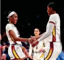  ?? TODAY SPORTS JEFF BLAKE/USA ?? South Carolina guard Bree Hall (23) and forward Sania Feagin (20) celebrate a play against North Carolina in the second half at Colonial Life Arena on Sunday.