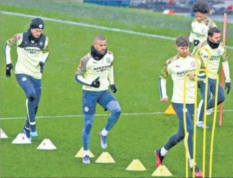  ?? REUTERS ?? Manchester City players during a training session in Manchester ahead of their visit to Madrid for the Champions League Round of 16 first leg clash against Real. n