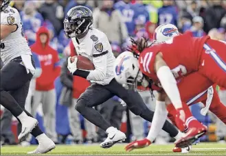  ?? John Munson / Associated Press ?? The Bills lost 24-17 to Baltimore in December, a game in which Ravens QB Lamar Jackson was held to a season-low 40 yards rushing but had three passing TDS.