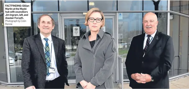  ?? Photograph by Colin Rennie ?? FACTFINDIN­G: Gillian Martin at the Macbi hub with councillor­s Jim Ingram, left, and Alastair Forsyth.