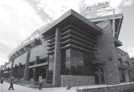  ?? Photos by Andy Cross, The Denver Post ?? Colorado State’s new football stadium, which debuts Saturday, includes a spiffy alumni center.