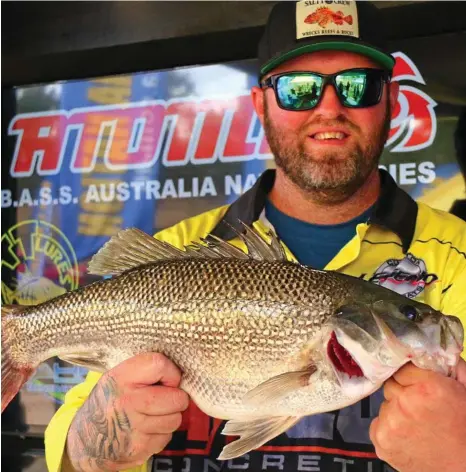  ?? PHOTO: LAUREN KELLY ?? DAM BEAUTY: Daniel McCoy with a nice bass taken from Boondooma Dam.