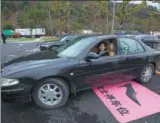  ?? NI YANQIANG / FOR CHINA DAILY ?? A female driver parks her car in a woman-only parking spot.