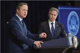  ?? KEVIN WOLF — THE ASSOCIATED PRESS ?? British Foreign Secretary David Cameron, left, speaks during a meeting with Secretary of State Antony Blinken at the State Department on Tuesday in Washington.