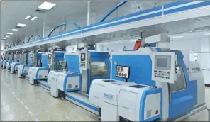  ?? PROVIDED TO CHINA DAILY ?? A glimpse of the production equipment at Shanghai Mint Co Ltd.