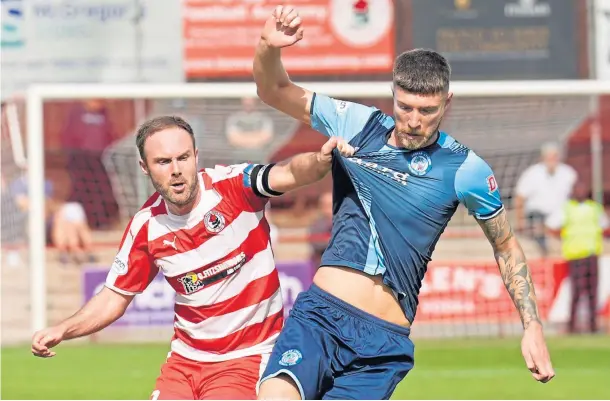  ?? ?? ON TARGET: Matty Aitken, right, hit home a penalty for Forfar against Elgin during the weekend’s clash at Station Park.