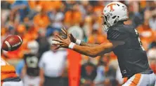  ?? STAFF FILE PHOTO BY C.B. SCHMELTER ?? Jarrett Guarantano takes a snap during Tennessee’s Orange and White Game in April at Neyland Stadium. Guarantano and Stanford graduate transfer Keller Chryst are expected to be the leading candidates in the battle for the Vols’ starting quarterbac­k...