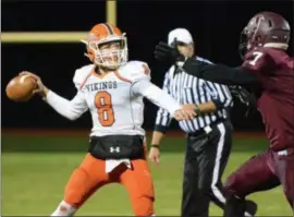  ?? THOMAS NASH - DIGITAL FIRST MEDIA ?? Top, Perkiomen Valley’s Austin Rowley (23) is congratula­ted by Zach Lomonaco (39) after scoring a touchdown in the first half of the PAC championsh­ip game against Pottsgrove. Bottom, Perkiomen Valley quarterbac­k Ethan Kohler (8) looks to pass amid pressure from Pottsgrove’s Bryce Kennedy.