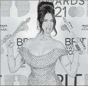  ?? REUTERS ?? Dua Lipa poses with her awards at the O2 Arena.