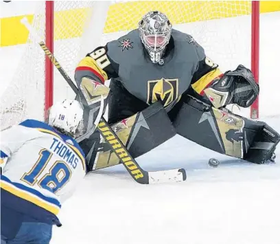  ?? JOHN LOCHER/AP ?? Golden Knights goaltender Robin Lehner blocks a shot by Blues center Robert Thomas during overtime Friday in Las Vegas.