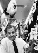  ?? Post-Gazette ?? In a 1993 photo, shop owner Mike Feinberg holds the popular Rat-in-atrap novelty item that came complete with its own rat.