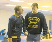  ?? SCOTT GARFIELD ?? Steve Carell, left, and Channing Tatum in “Foxcatcher.”