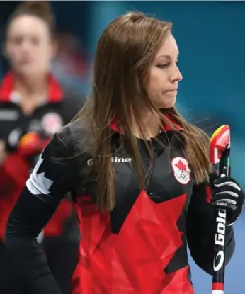  ?? STEVE RUSSELL/TORONTO STAR ?? Canadian skip Rachel Homan stares at her broom after a shot against Great Britain. The loss to Great Britain, coached by Glenn Howard, knocked Canada out of medal contention.